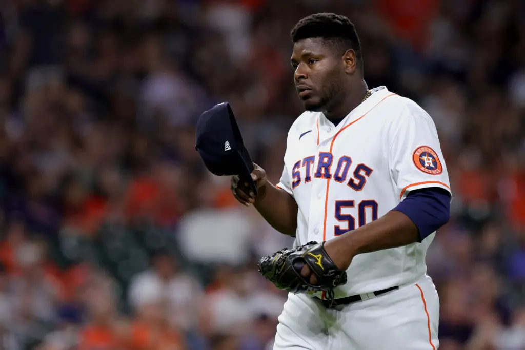 HOUSTON, TEXAS - MAY 19: Hector Neris #50 of the Houston Astros exits the field after striking out Jonah Heim #28 of the Texas Rangers to get out of the eigth inning at Minute Maid Park on May 19, 2022 in Houston, Texas