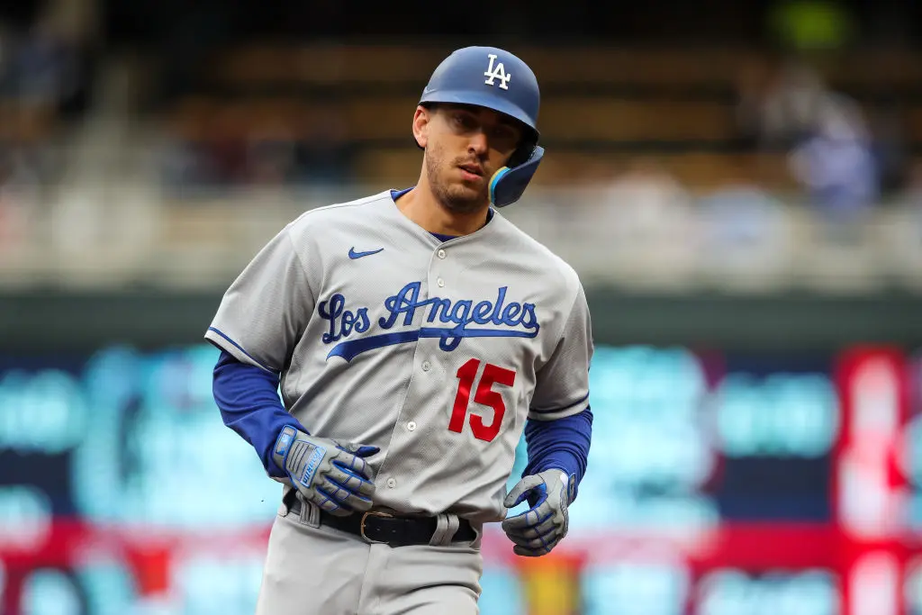 MINNEAPOLIS, MN - APRIL 13: Austin Barnes #15 of the Los Angeles Dodgers rounds the bases after hitting a solo home run against the Minnesota Twins in the eighth inning of the game at Target Field on April 13, 2022 in Minneapolis, Minnesota. The Dodgers defeated the Twins 7-0