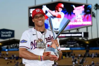 LOS ANGELES, CALIFORNIA - JULY 18: National League All-Star Juan Soto #22 of the Washington Nationals poses with the 2022 T-Mobile Home Run Derby trophy after winning the event at Dodger Stadium on July 18, 2022 in Los Angeles, California