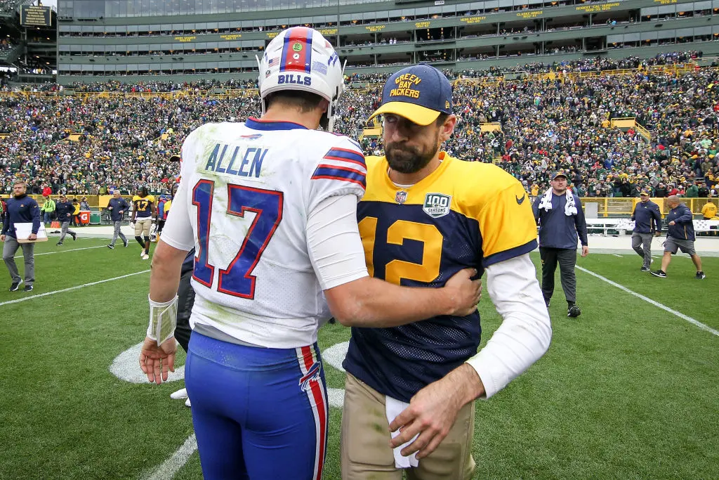 GREEN BAY, WI - SEPTEMBER 30: Josh Allen #17 of the Buffalo Bills and Aaron Rodgers #12 of the Green Bay Packers meet after the Green Bay Packers beat the Buffalo Bills 22-0 at Lambeau Field on September 30, 2018 in Green Bay, Wisconsin
