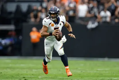 LAS VEGAS, NEVADA - OCTOBER 02: Russell Wilson #3 of the Denver Broncos scrambles and looks to pass against the Las Vegas Raiders during the first half of a game at Allegiant Stadium on October 02, 2022 in Las Vegas, Nevada