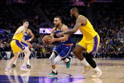 SAN FRANCISCO, CALIFORNIA - FEBRUARY 12: Stephen Curry #30 of the Golden State Warriors drives to the basket against LeBron James #6 of the Los Angeles Lakers in the second half at Chase Center on February 12, 2022 in San Francisco, California.