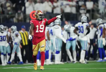 ARLINGTON, TEXAS - JANUARY 16: Deebo Samuel #19 of the San Francisco 49ers points down field against the Dallas Cowboys during an NFL wild-card playoff football game at AT&T Stadium on January 16, 2022 in Arlington, Texas.