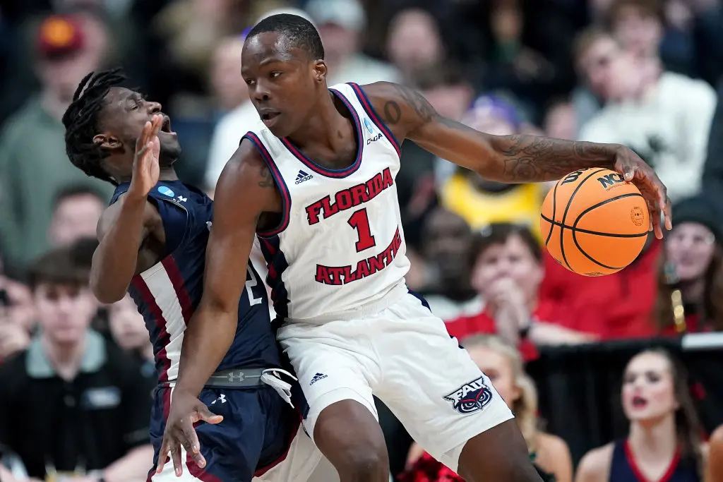 COLUMBUS, OHIO - MARCH 19: Johnell Davis #1 of the Florida Atlantic Owls drives to the basket against Demetre Roberts #2 of the Fairleigh Dickinson Knights during the second half in the second round game of the NCAA Men's Basketball Tournament at Nationwide Arena on March 19, 2023 in Columbus, Ohio
