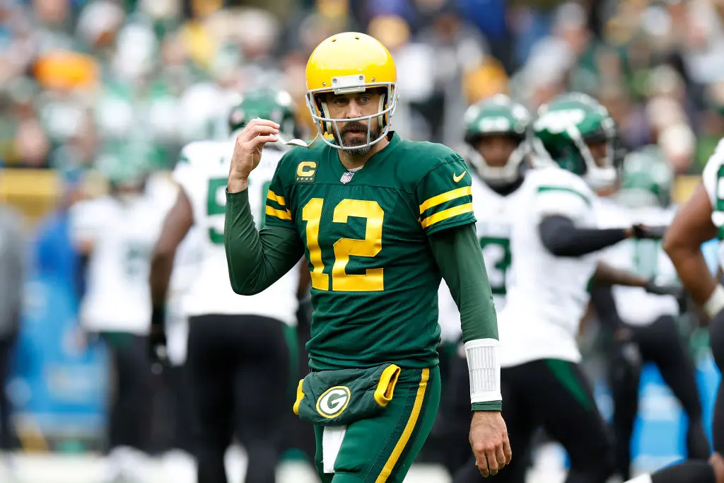 GREEN BAY, WISCONSIN - OCTOBER 16: Aaron Rodgers #12 of the Green Bay Packers reacts to a fumble in the third quarter of a game against the New York Jets at Lambeau Field on October 16, 2022 in Green Bay, Wisconsin.