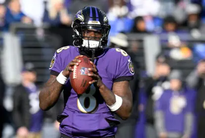 BALTIMORE, MARYLAND - DECEMBER 04: Lamar Jackson #8 of the Baltimore Ravens warms up before the game against the Denver Broncos at M&T Bank Stadium on December 04, 2022 in Baltimore, Maryland.