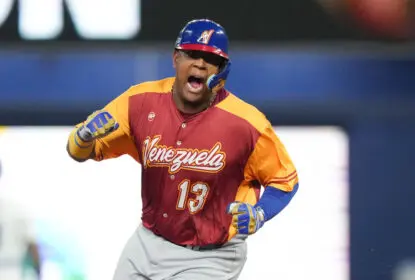 MIAMI, FLORIDA - MARCH 12: Salvador Perez #13 of Venezuela celebrates while rounding the bases after Anthony Santander hit a three run home run in the first inning against Puerto Rico at loanDepot park on March 12, 2023 in Miami, Florida