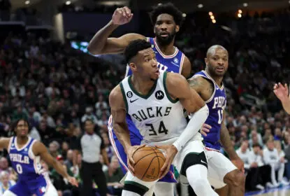 MILWAUKEE, WISCONSIN - APRIL 02: Giannis Antetokounmpo #34 of the Milwaukee Bucks is defended by Joel Embiid #21 of the Philadelphia 76ers during the first half of a game at Fiserv Forum on April 02, 2023 in Milwaukee, Wisconsin.
