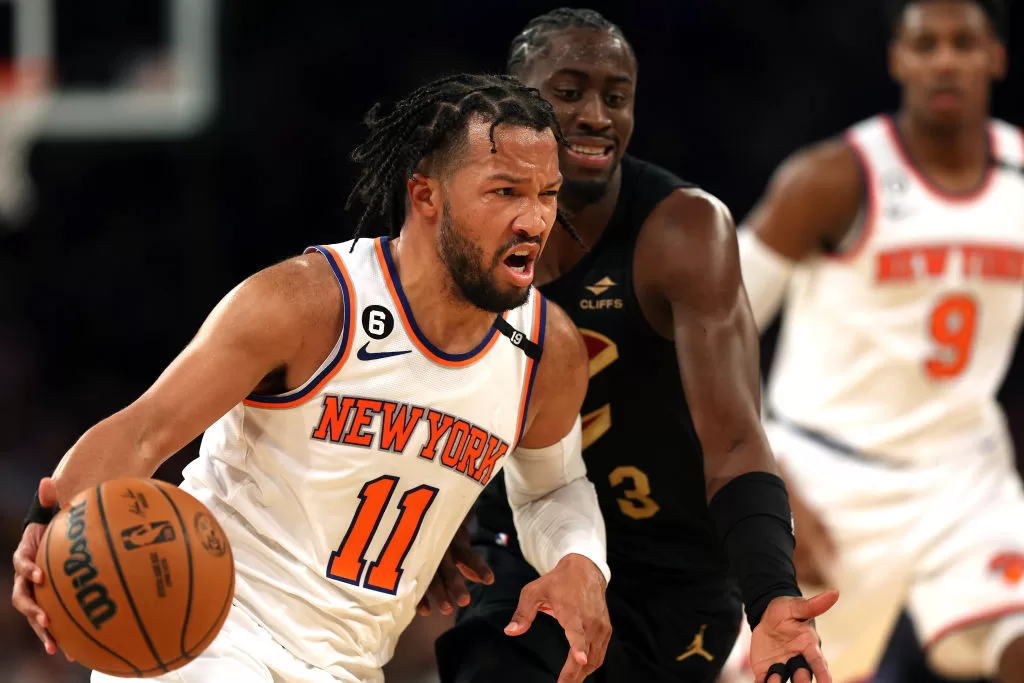 NEW YORK, NEW YORK - APRIL 21: Jalen Brunson #11 of the New York Knicks drives to the basket as Caris LeVert #3 of the Cleveland Cavaliers defends during game three of the Eastern Conference playoffs at Madison Square Garden on April 21, 2023 in New York City