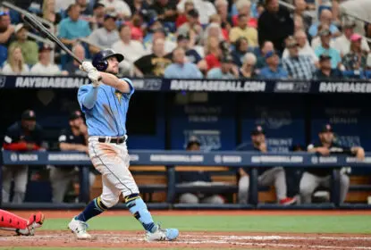 ST PETERSBURG, FLORIDA - APRIL 13: Brandon Lowe #8 of the Tampa Bay Rays watches the ball after hitting a home run in the seventh inning against the Boston Red Sox at Tropicana Field on April 13, 2023 in St Petersburg, Florida