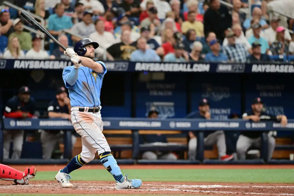 ST PETERSBURG, FLORIDA - APRIL 13: Brandon Lowe #8 of the Tampa Bay Rays watches the ball after hitting a home run in the seventh inning against the Boston Red Sox at Tropicana Field on April 13, 2023 in St Petersburg, Florida