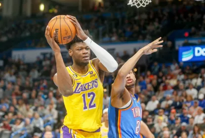 OKLAHOMA CITY, OKLAHOMA - MARCH 01: Mo Bamba #12 of the Los Angeles Lakers grabs a rebound over Aaron Wiggins #21 of the Oklahoma City Thunder during the second quarter at Paycom Center on March 01, 2023 in Oklahoma City, Oklahoma.