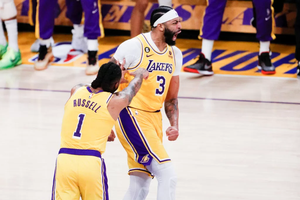 uLos Angeles, CA - May 12: Los Angeles Lakers forward Anthony Davis, right, celebrates with guard D'Angelo Russell (1) during the second half of the NBA Playoffs Western Conference semifinals against the Golden State Warriors at Crypto.com Arena on Friday, May 12, 2023 in Los Angeles, CA.