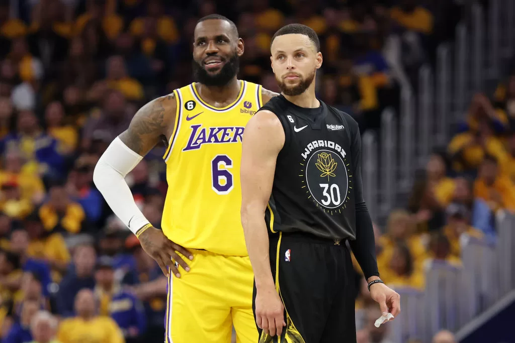 SAN FRANCISCO, CALIFORNIA - MAY 02: LeBron James #6 of the Los Angeles Lakers stands next to Stephen Curry #30 of the Golden State Warriors during the second quarter in game one of the Western Conference Semifinal Playoffs at Chase Center on May 02, 2023 in San Francisco, California.