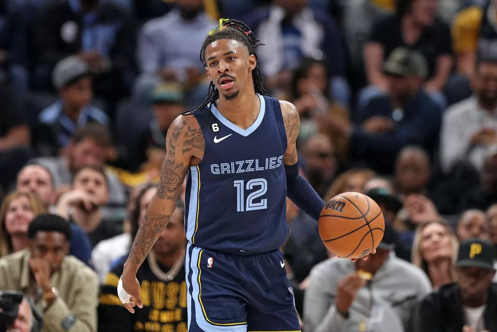 MEMPHIS, TENNESSEE - APRIL 16: Ja Morant #12 of the Memphis Grizzlies brings the ball up court during the game against the Los Angeles Lakers during Game One of the Western Conference First Round Playoffs at FedExForum on April 16, 2023 in Memphis, Tennessee.