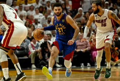 MIAMI, FL - JUNE 7: Jamal Murray (27) of the Denver Nuggets handles as Caleb Martin (16) of the Miami Heat defends in the fourth quarter of the Nuggets' 104-94 win during Game 3 of the NBA Finals at the Kaseya Center in Miami on Wednesday, June 7, 2023