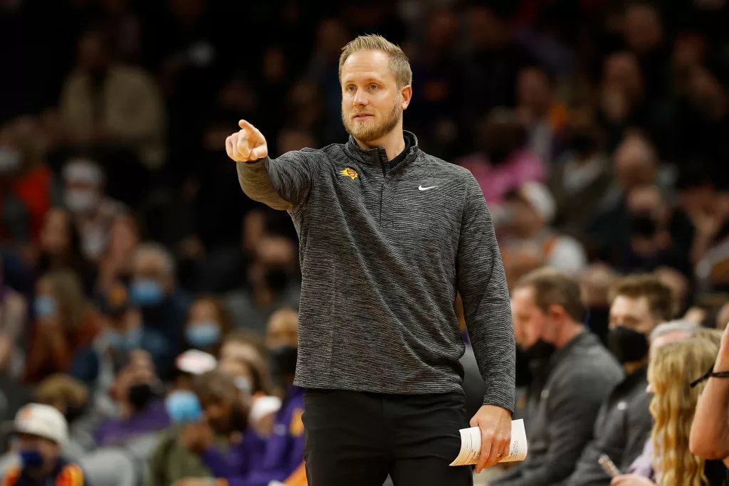 PHOENIX, ARIZONA - DECEMBER 27: Associate head coach Kevin Young of the Phoenix Suns during the first half of the NBA game against the Memphis Grizzlies at Footprint Center on December 27, 2021 in Phoenix, Arizona.