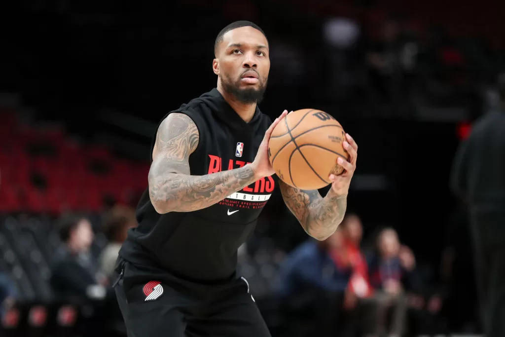 PORTLAND, OREGON - MARCH 01: Damian Lillard #0 of the Portland Trail Blazers warms up before a game against the New Orleans Pelicans at Moda Center on March 01, 2023 in Portland, Oregon.
