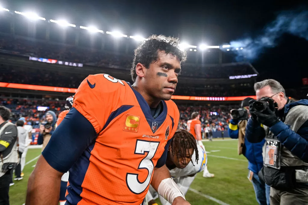 DENVER, CO - JANUARY 8: Denver Broncos quarterback Russell Wilson (3) on the field after a win against the Los Angeles Chargers after a game at Empower Field at Mile High on January 8, 2023 in Denver, Colorado