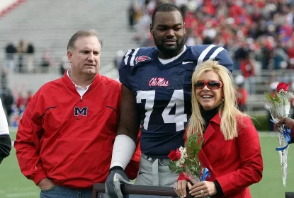 OXFORD, MS - NOVEMBER 28: Michael Oher #74 of the Ole Miss Rebels stands with his family during senior ceremonies prior to a game against the Mississippi State Bulldogs at Vaught-Hemingway Stadium on November 28, 2008 in Oxford, Mississippi