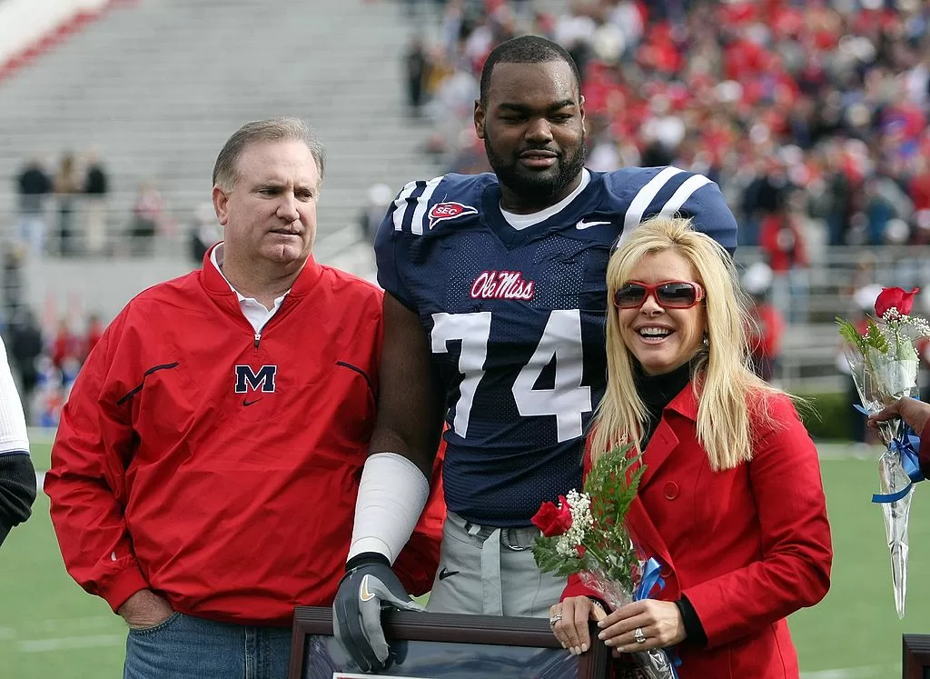 OXFORD, MS - NOVEMBER 28: Michael Oher #74 of the Ole Miss Rebels stands with his family during senior ceremonies prior to a game against the Mississippi State Bulldogs at Vaught-Hemingway Stadium on November 28, 2008 in Oxford, Mississippi
