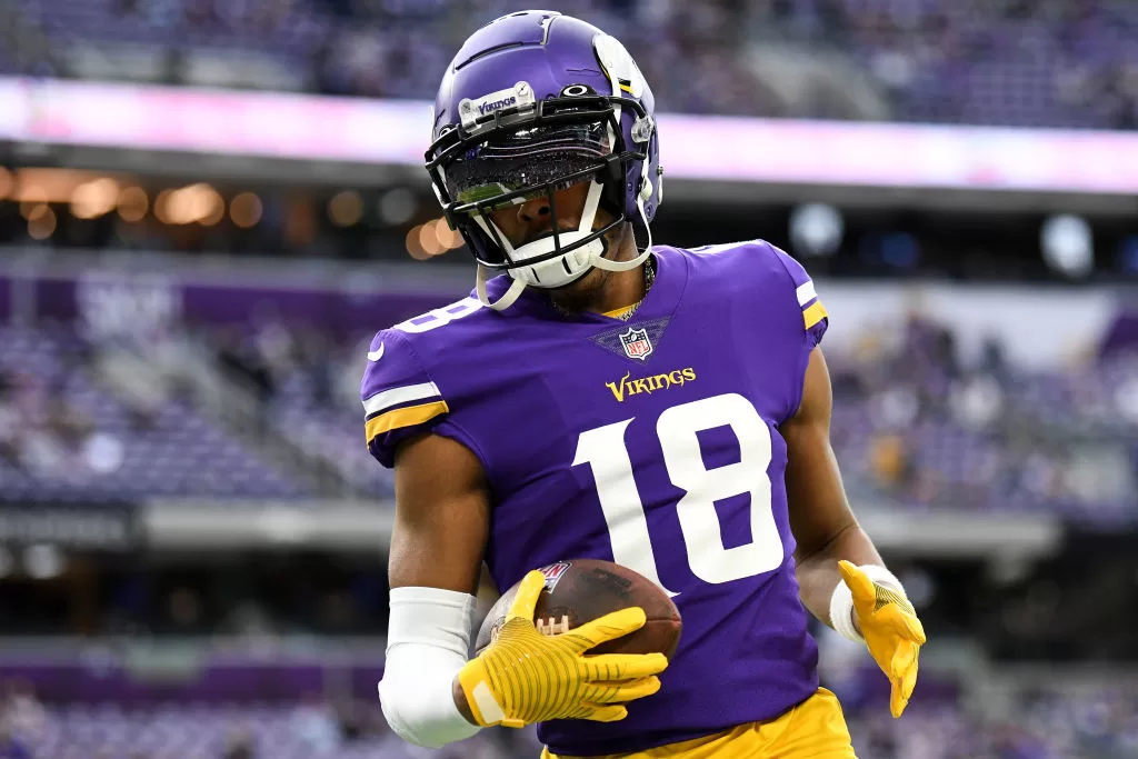 MINNEAPOLIS, MINNESOTA - DECEMBER 17: Justin Jefferson #18 of the Minnesota Vikings warms up prior to a game against the Indianapolis Colts at U.S. Bank Stadium on December 17, 2022 in Minneapolis, Minnesota