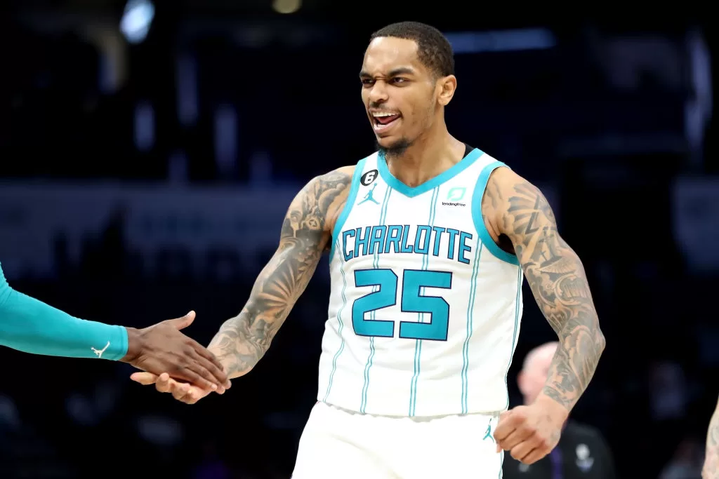 CHARLOTTE, NORTH CAROLINA - FEBRUARY 13: P.J. Washington #25 of the Charlotte Hornets celebrates after making a three pointer during the fourth period of a basketball game against the Atlanta Hawks at Spectrum Center on February 13, 2023 in Charlotte, North Carolina.