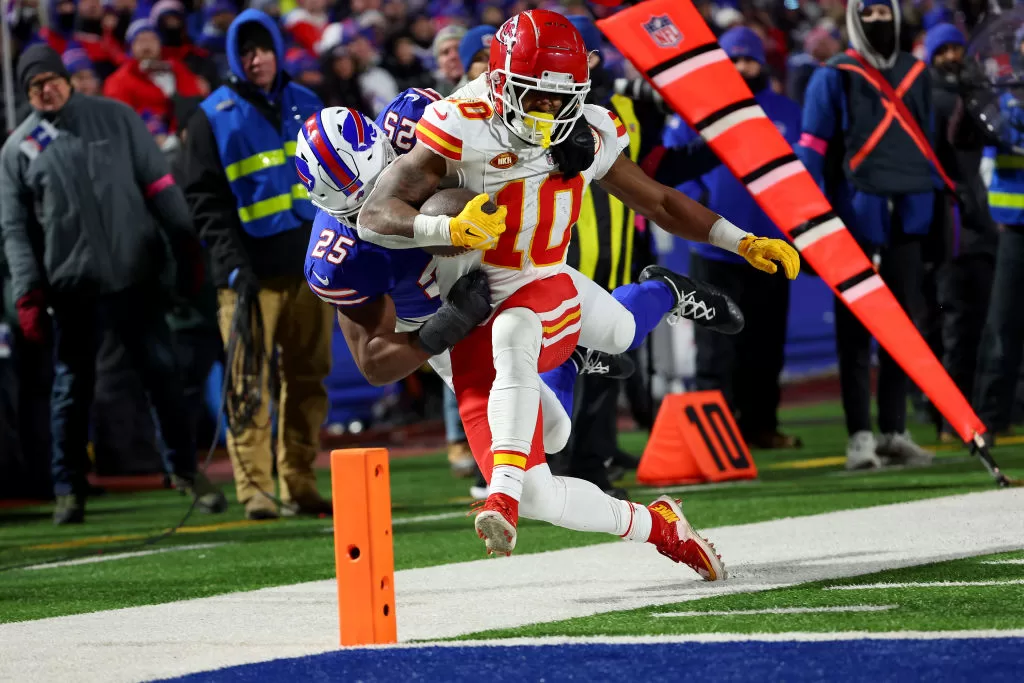 ORCHARD PARK, NEW YORK - JANUARY 21: Tyrel Dodson #25 of the Buffalo Bills tackles Isiah Pacheco #10 of the Kansas City Chiefs out of bounds during the third quarter in the AFC Divisional Playoff game at Highmark Stadium on January 21, 2024 in Orchard Park, New York. (Photo by Timothy T Ludwig/Getty Images)