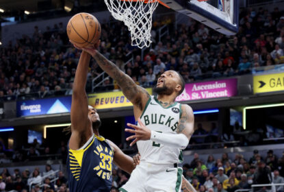 INDIANAPOLIS, INDIANA - JANUARY 03: Damian Lillard #0 of the Milwaukee Bucks shoots the ball against the Indiana Pacers at Gainbridge Fieldhouse on January 03, 2024 in Indianapolis, Indiana.