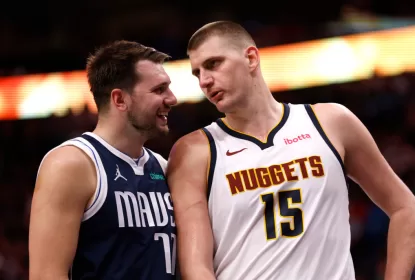 DALLAS, TX - MARCH 17: Luka Doncic #77 of the Dallas Mavericks and Nikola Jokic #15 of the Denver Nuggets talk during a beak in the action in the second half at American Airlines Center on March 17, 2024 in Dallas, Texas.